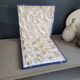 12 Limoges art porcelain knife rests in their case