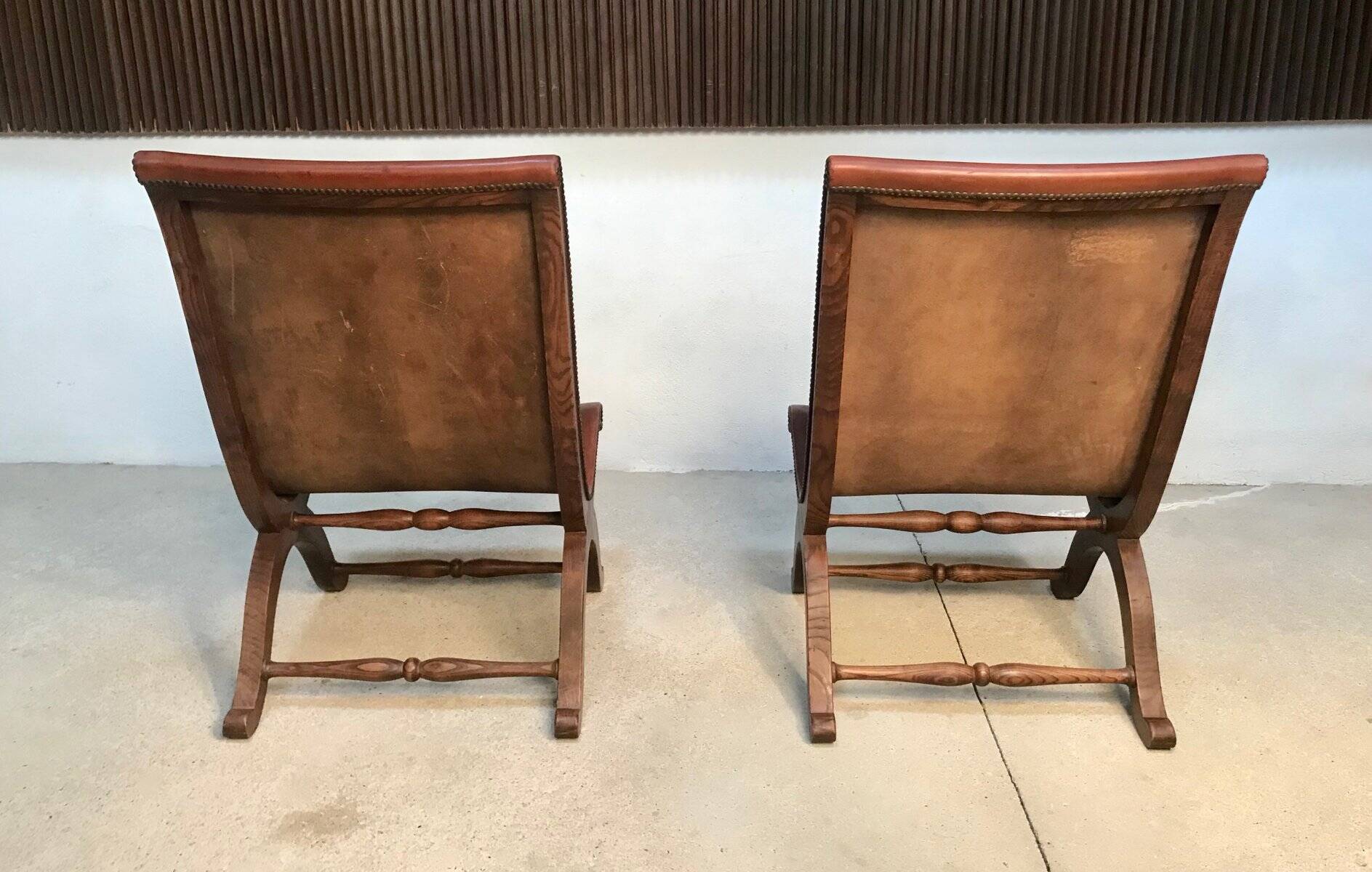 Set of 2 Spanish high-back leather slipper chairs by Pierre Lottier, 1950s