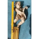 Golden white wooden cherub