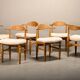 Henning Kjærnulf dining chairs set in Oak and Sheepskin, Denmark, 1960s
