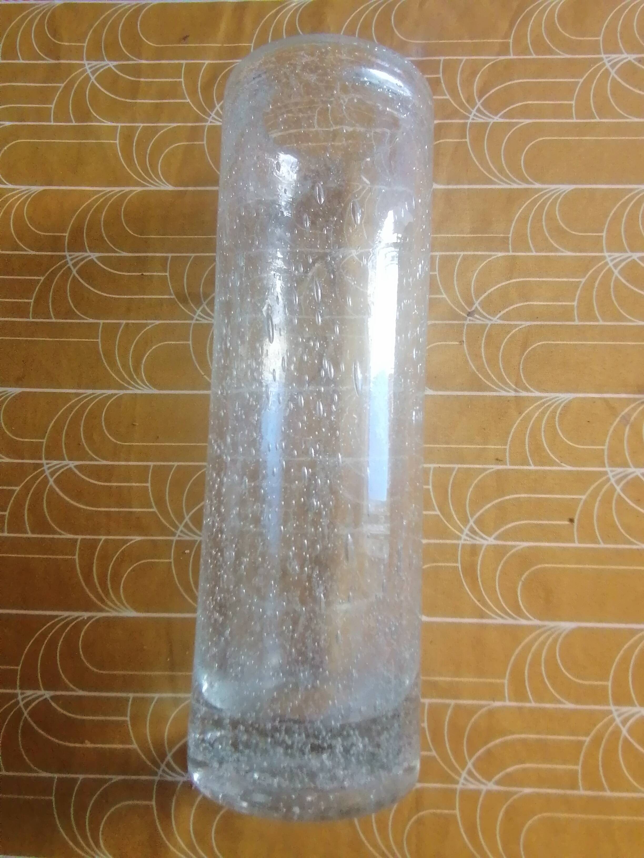 Old biot glass roller vase