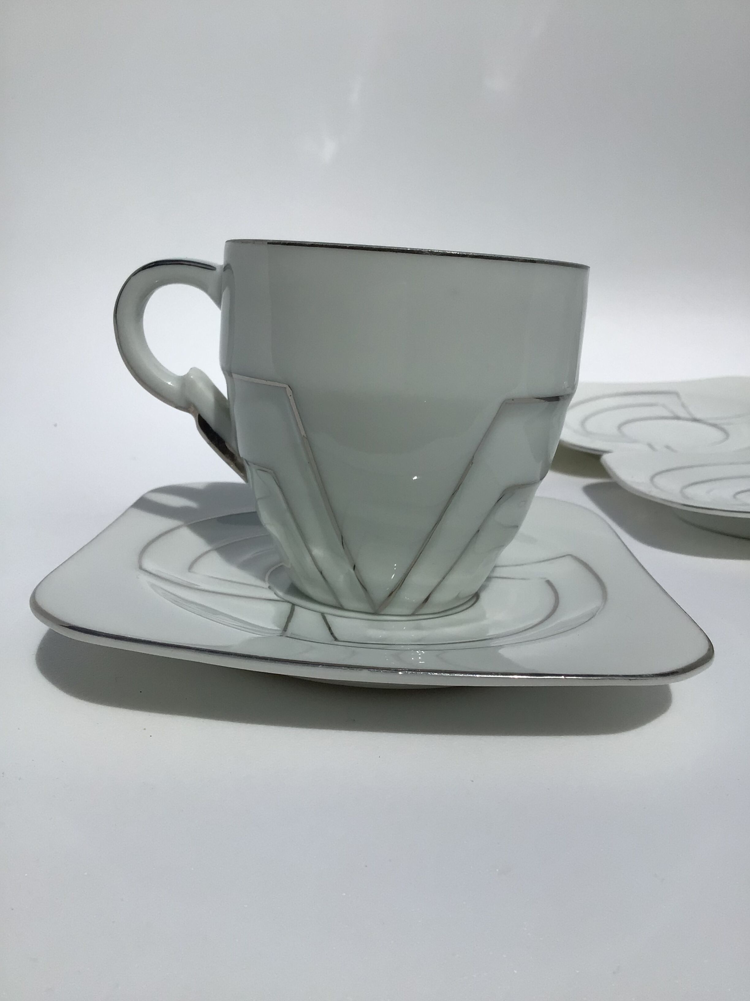 4 fine porcelain cups art deco silver thread