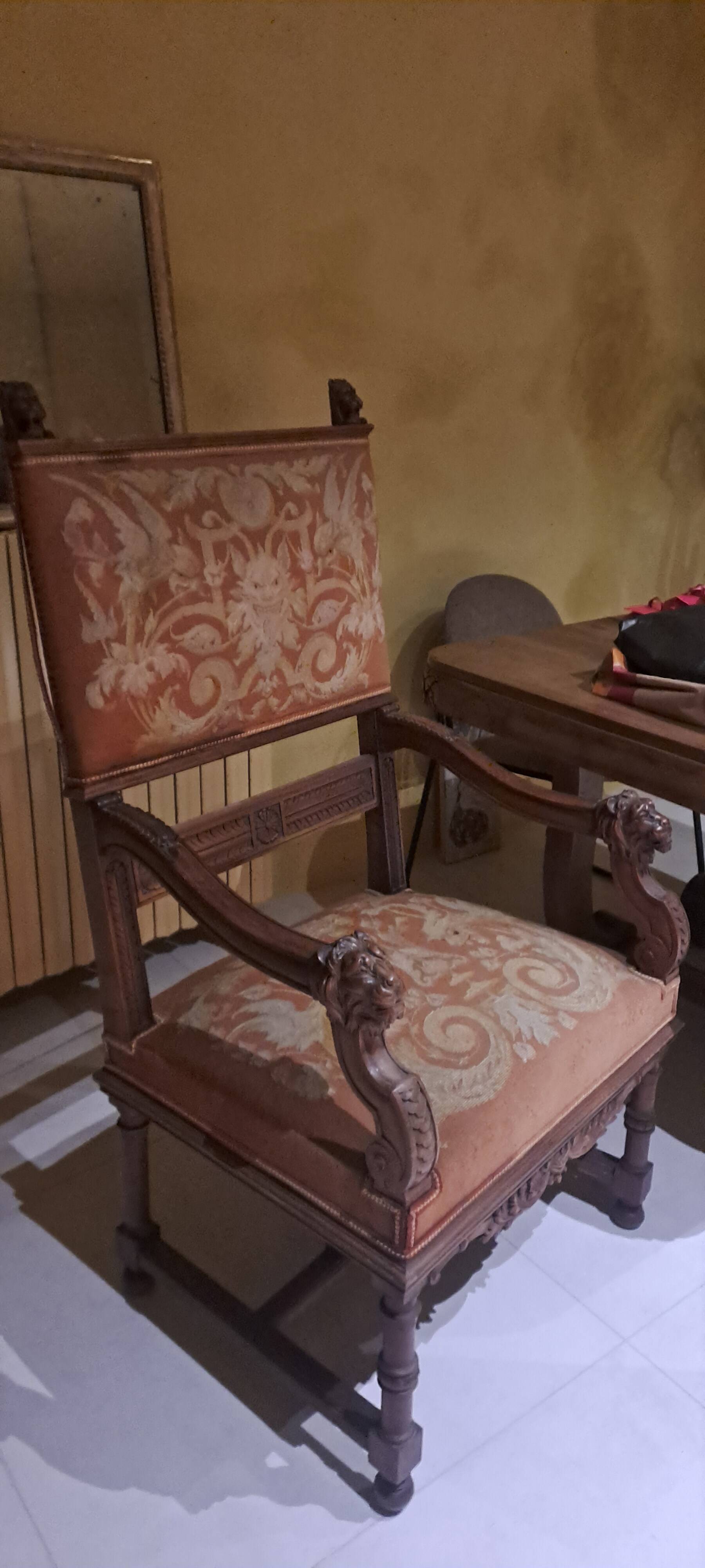 Antique lion head armchair