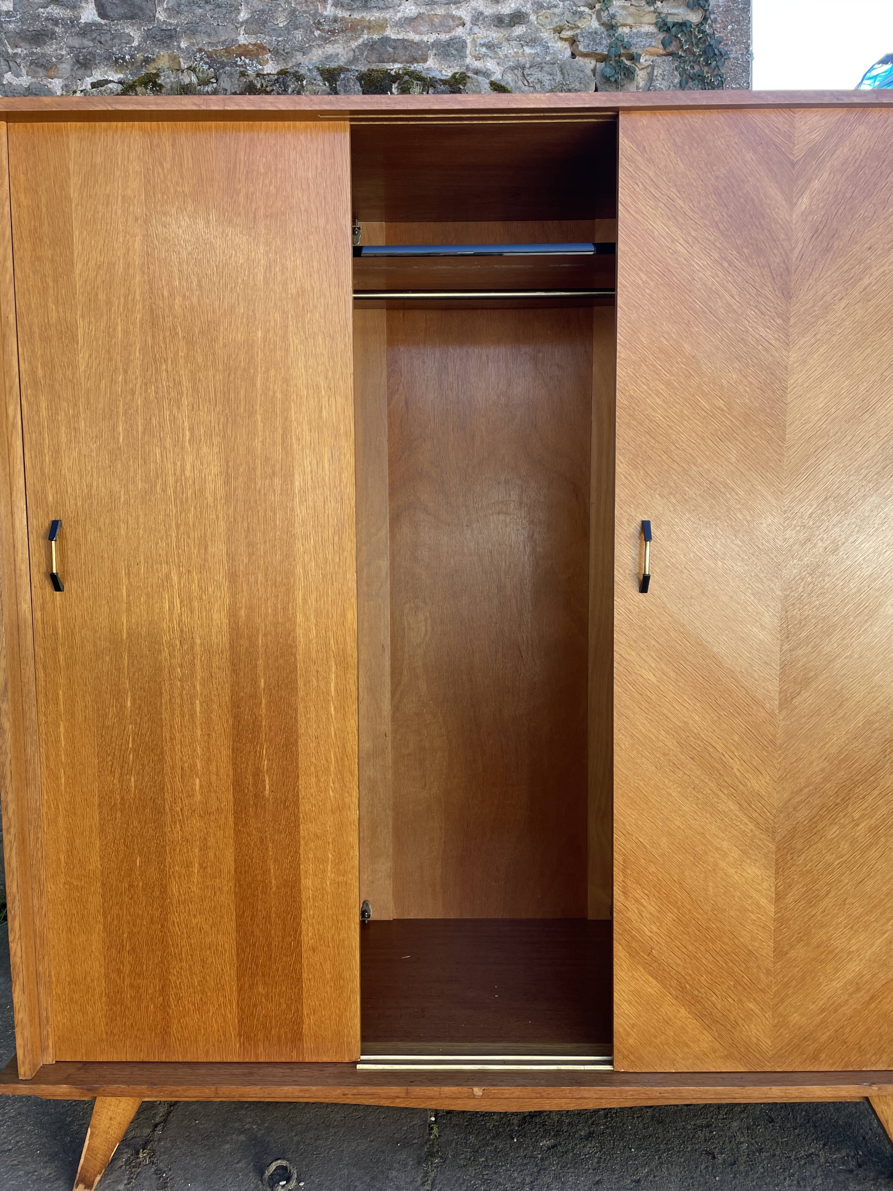 Light oak sliding door wardrobe, 1960