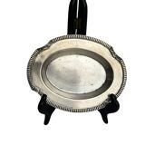 Oval metal silver-plated tray with hallmarks from the early 20th century.
