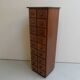 Antique oak apothecary cabinet with drawers