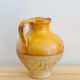 Vintage jug in glazed earth
