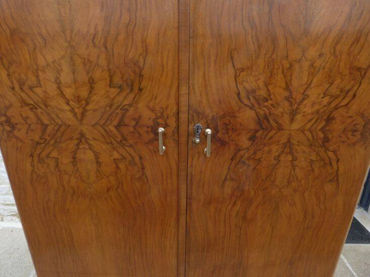 Wardrobe on a plinth in walnut and walnut veneer circa 1940.