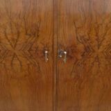 Wardrobe on a plinth in walnut and walnut veneer circa 1940.