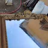 19th century mirror in wood and gilded stucco "scallop shell"