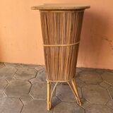 Vintage rattan bar from the 60s with rounded shapes and a shelf for glasses
