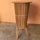 Vintage rattan bar from the 60s with rounded shapes and a shelf for glasses