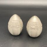 Egg-shaped metal salt and pepper shakers with Asian countryside motif