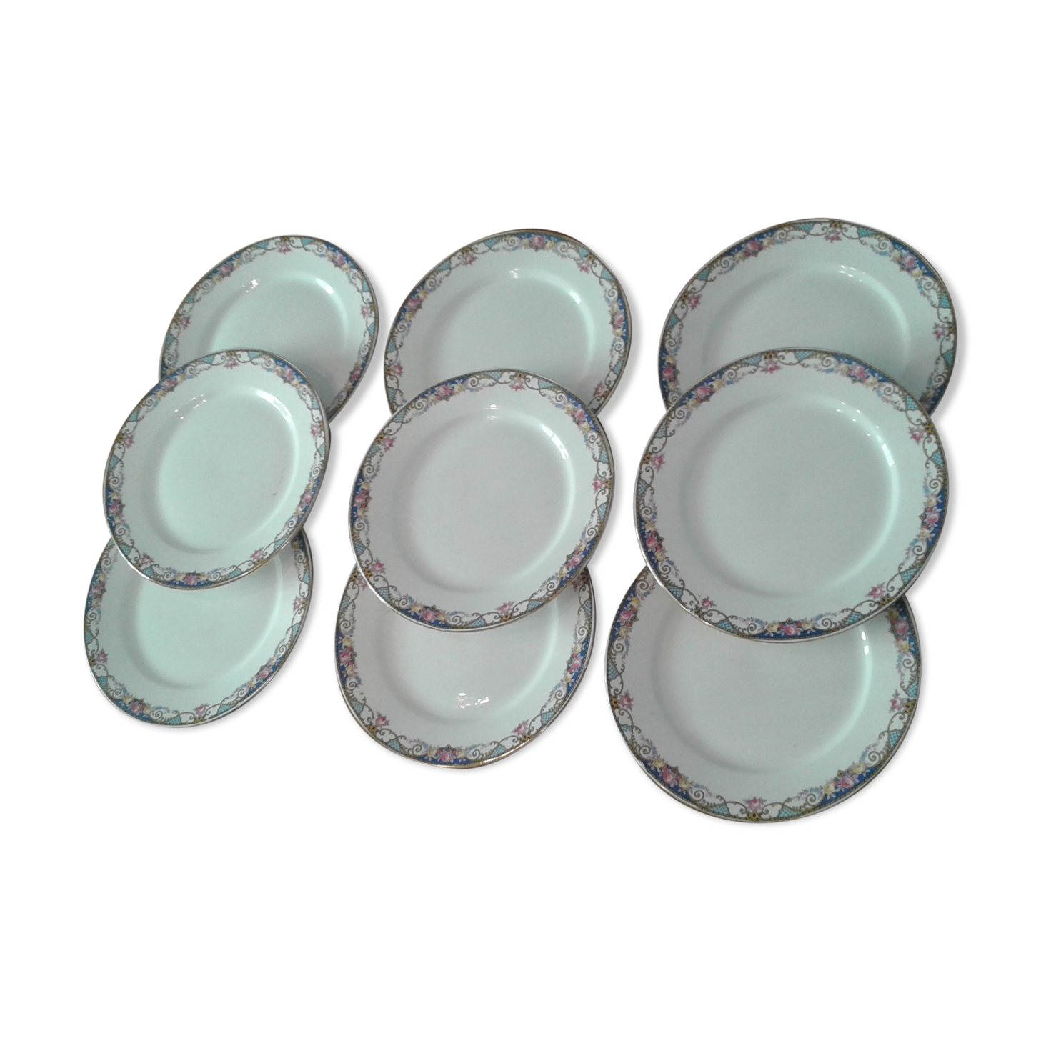 9 dessert plates and heel plate. sarreguemines,flower decirs