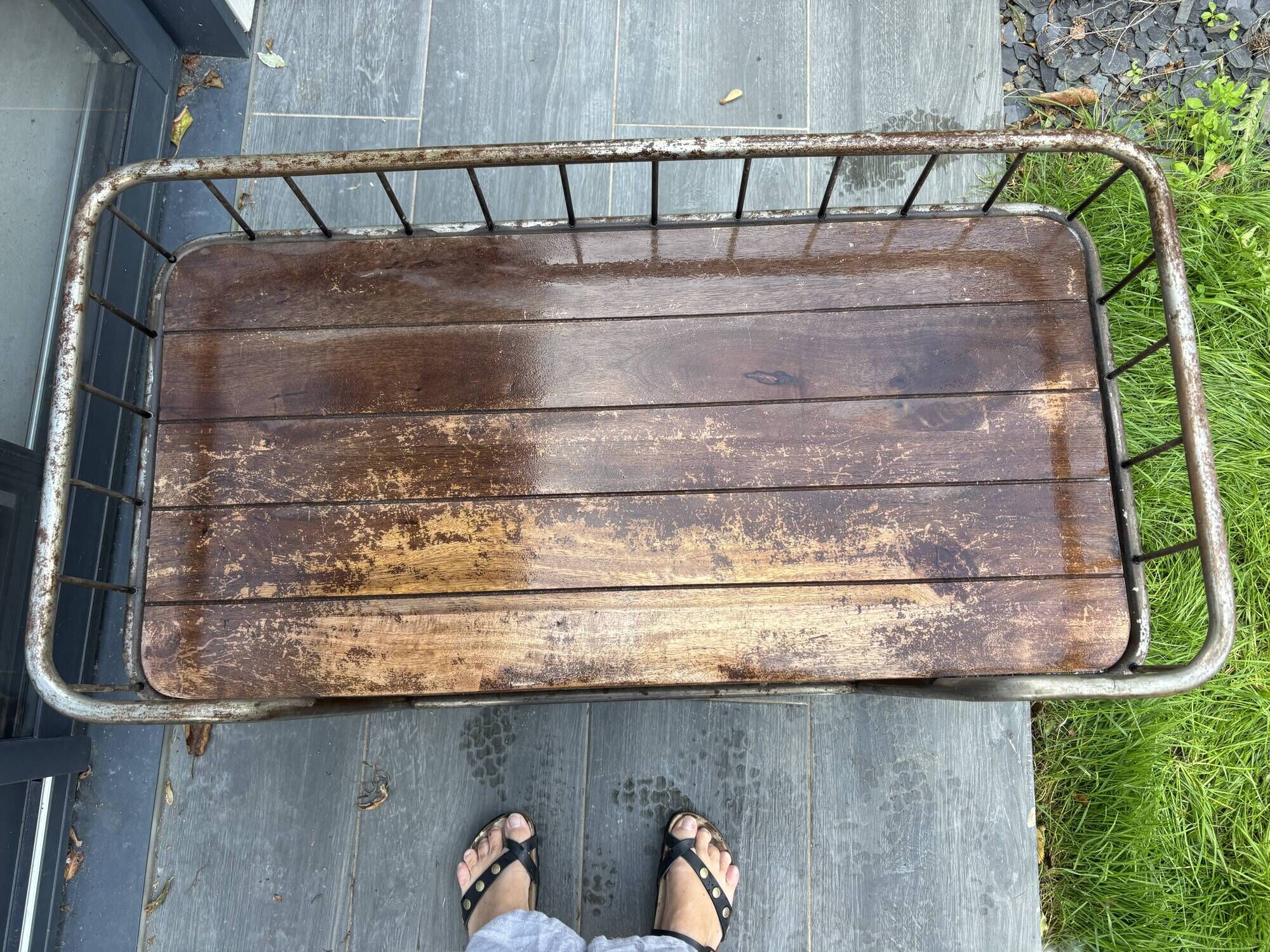 Industrial metal and wood serving trolley on wheels