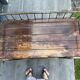 Industrial metal and wood serving trolley on wheels