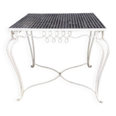 Old wrought iron table / ceramic tile top