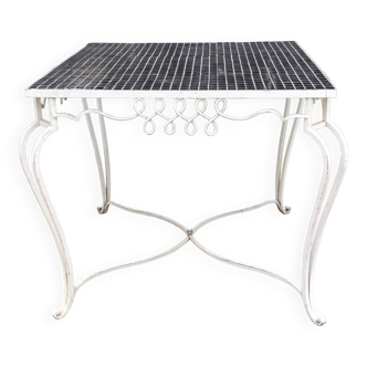 Old wrought iron table / ceramic tile top