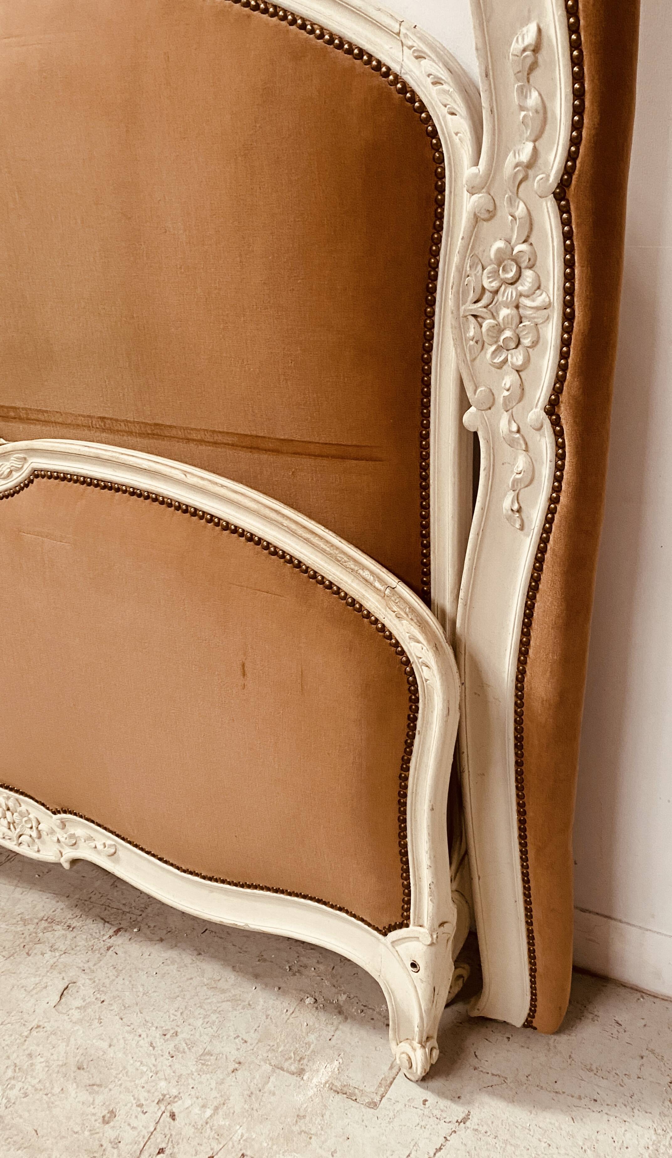 Louis XV style bed in patinated hornbeam, 20th century.