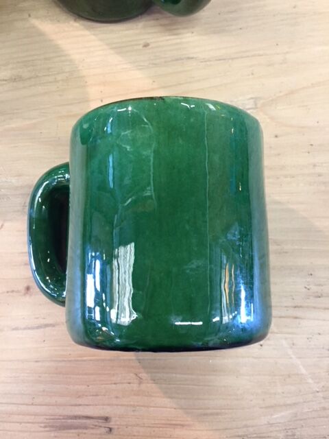 Enamelled terracotta mugs