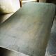 Old bistro table – cast iron legs and natural slate top