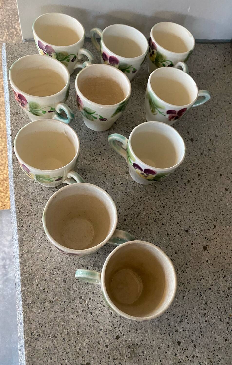 10 slipware cups, pansies