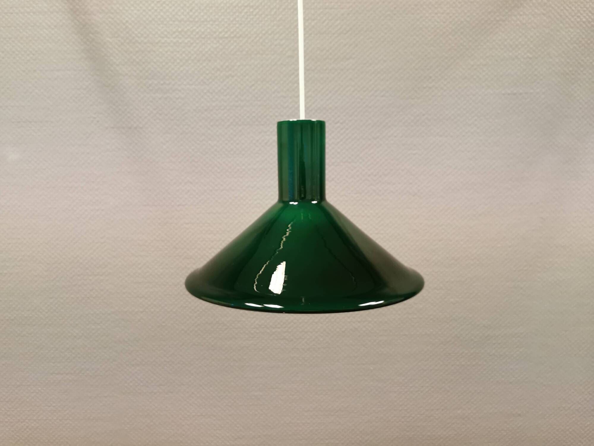 Green glass hanging lamp in double layer glass. Designed by Michael Bang for Holmegaard Denmark 1972