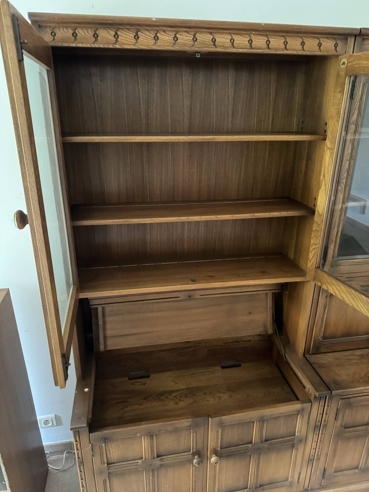 Ercol library cabinets storage England in elm