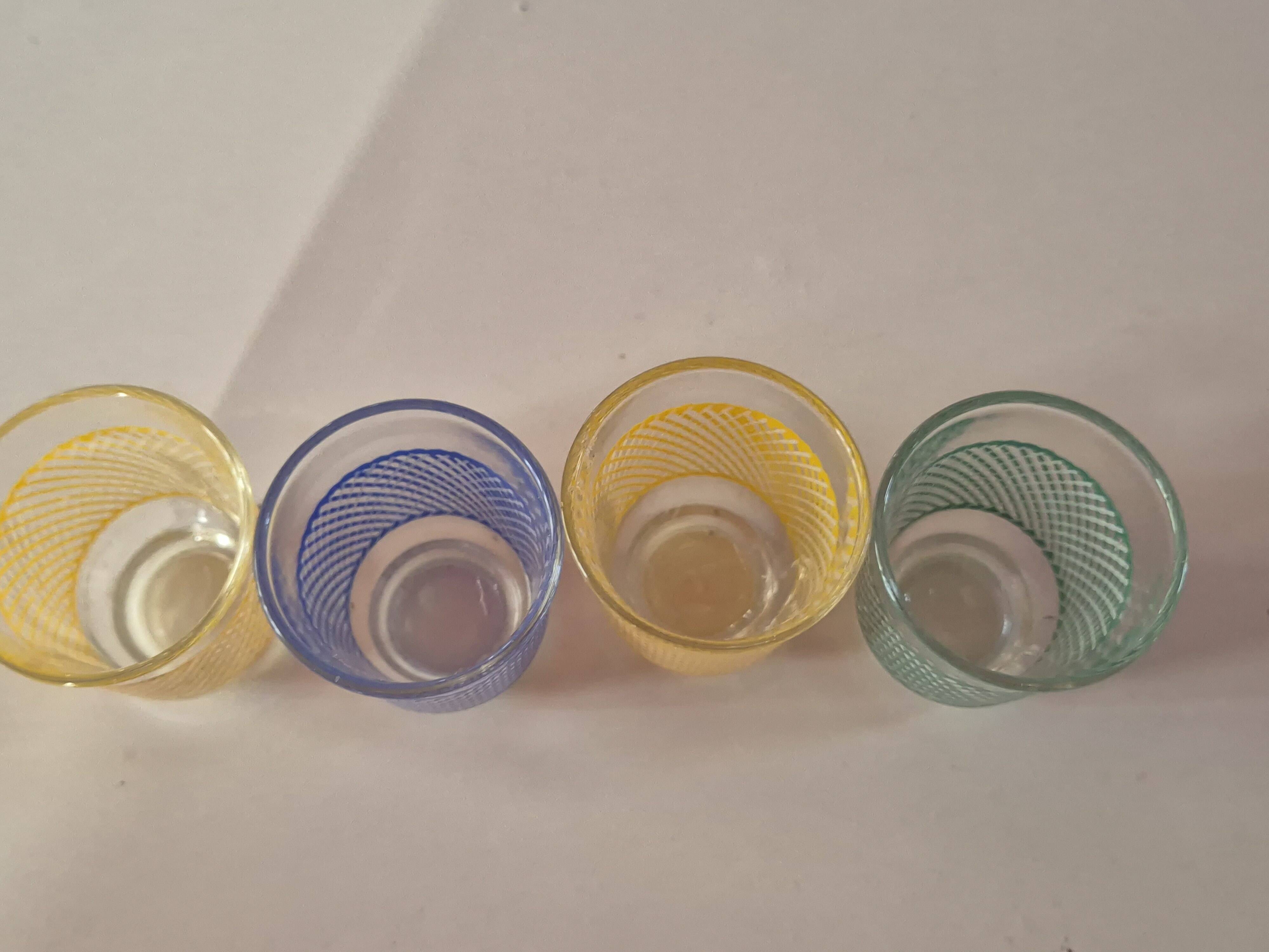 set of 4 vintage liqueur glasses in yellow, green, and blue