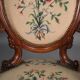 Pair of Louis Philippe armchairs with petit point upholstery.