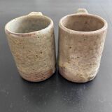 Pair of signed stoneware mugs