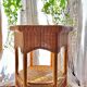 Vintage hexagonal rattan side table with original label, 1980.