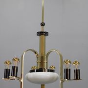 1930s Czech Art Deco brass chandelier with milk glass center and exposed bulbs