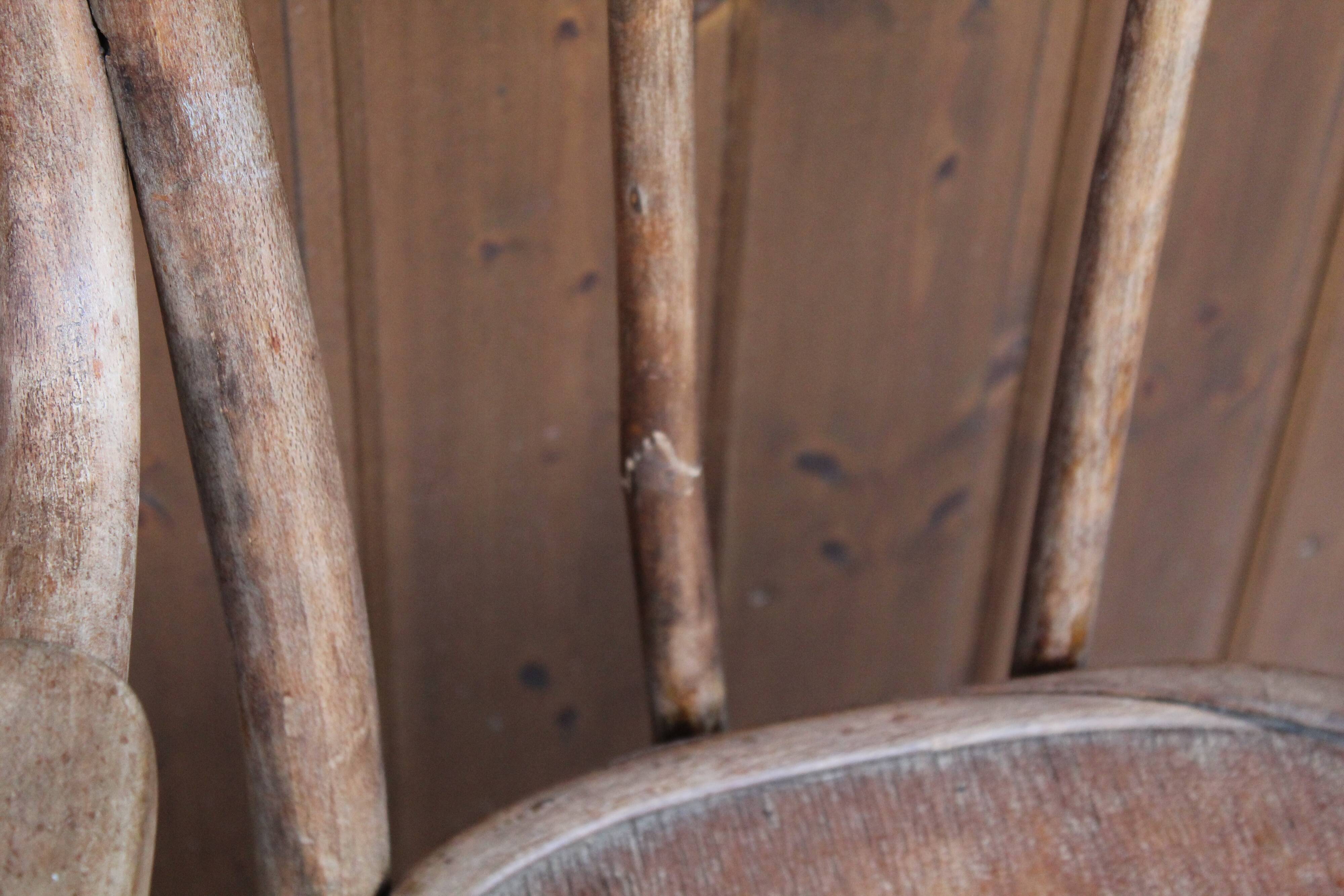 Curved wooden armchair