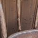 Curved wooden armchair