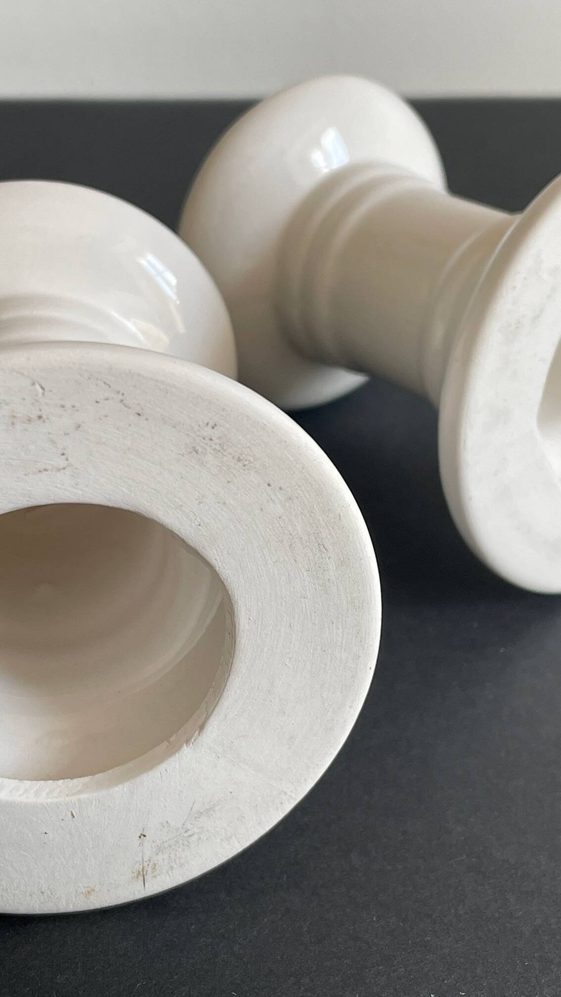 Pair of White Ceramic Candlesticks