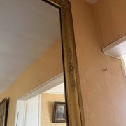 Large antique mirror in the Napoléon III style.