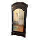 Black wardrobe with a mirrored door in ebony finish.