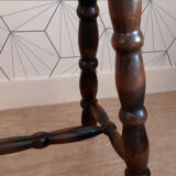 Brown turned wooden stool.