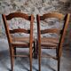 Set of 4 antique dining chairs with caned seats, beech, France, circa 1900–1920.