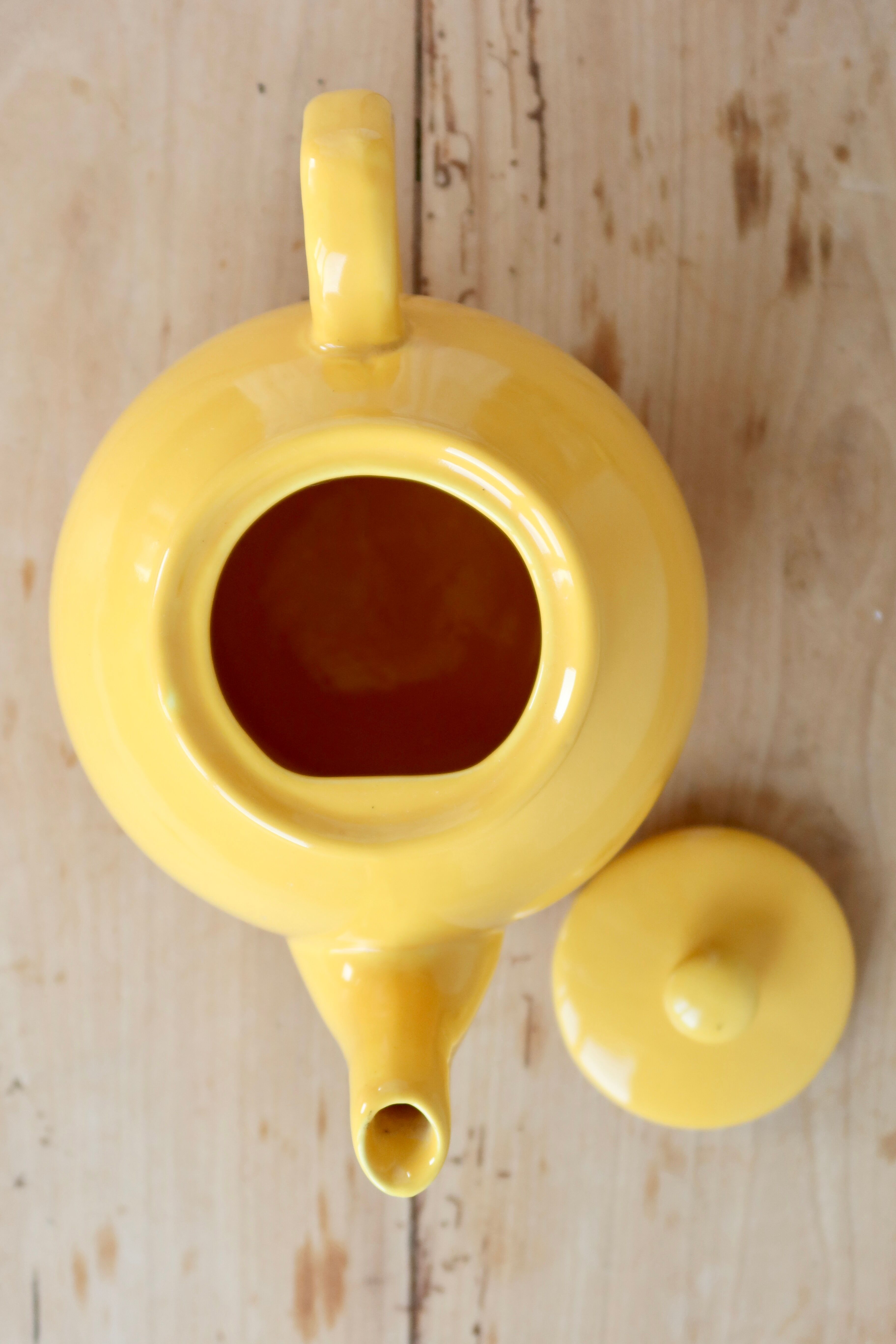 Vintage bright yellow ceramic teapot