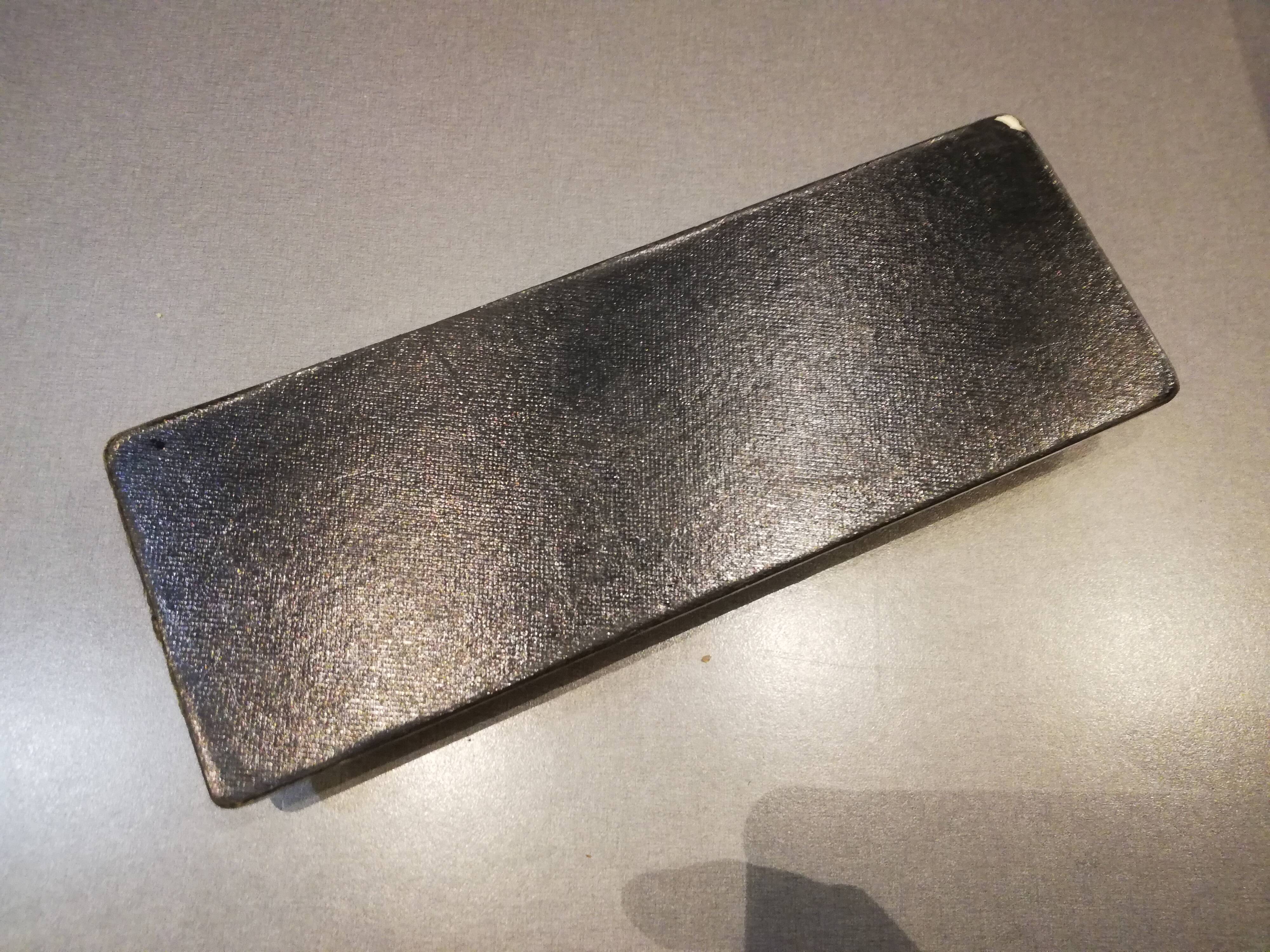 Set office stitched leather and brass wears feather pens