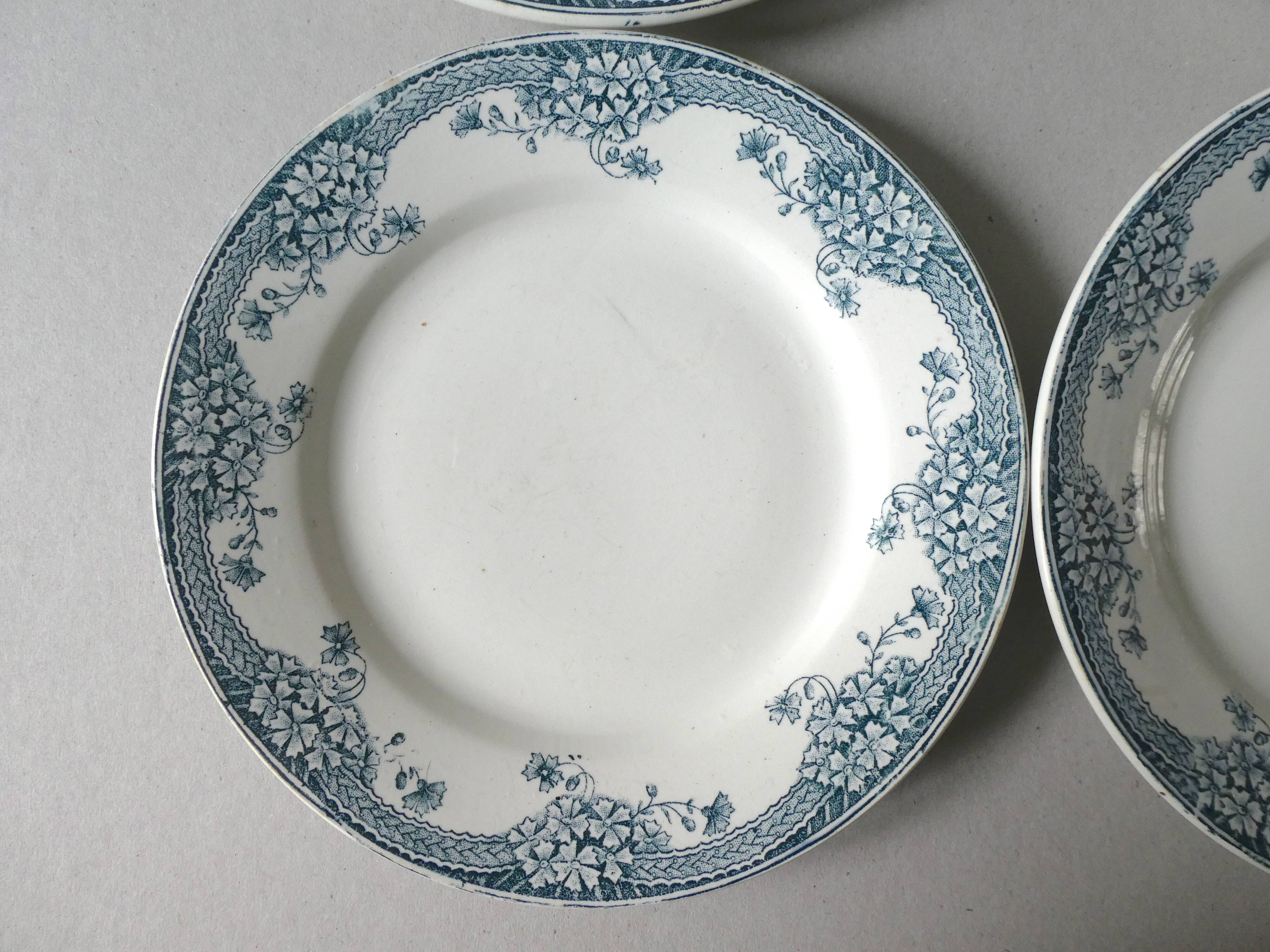 Set of 6 flat plates, Saint Amand model Suzanne, floral decoration