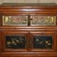 Antique Chinese armoire hand-carved around 1880 with country-style handles.