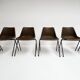 Brown and black set of 6 Polyprop chairs on a metal frame. The Polyprop cha