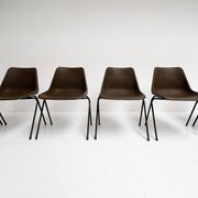 Brown and black set of 6 Polyprop chairs on a metal frame. The Polyprop cha