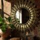 Large Italian sunburst wall mirror in gilded metal, 1960s-70s.