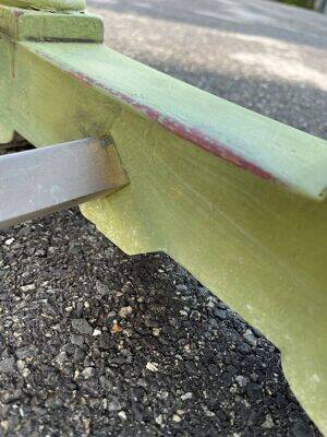 Old table with patinated green legs