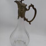 Large balloon glass carafe with pewter frame.