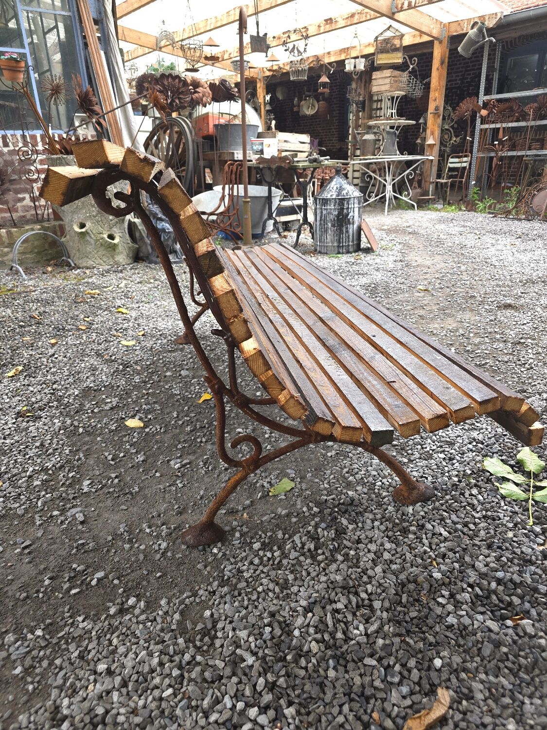 Cast iron garden bench with wooden slats